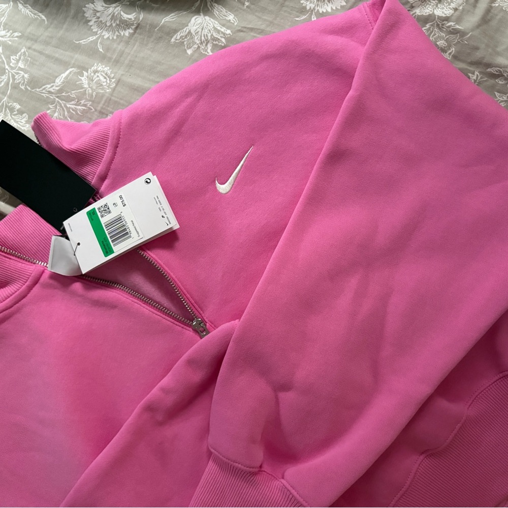 Nike Pink Zip-Up Top- New with Tags.  Already discounted.